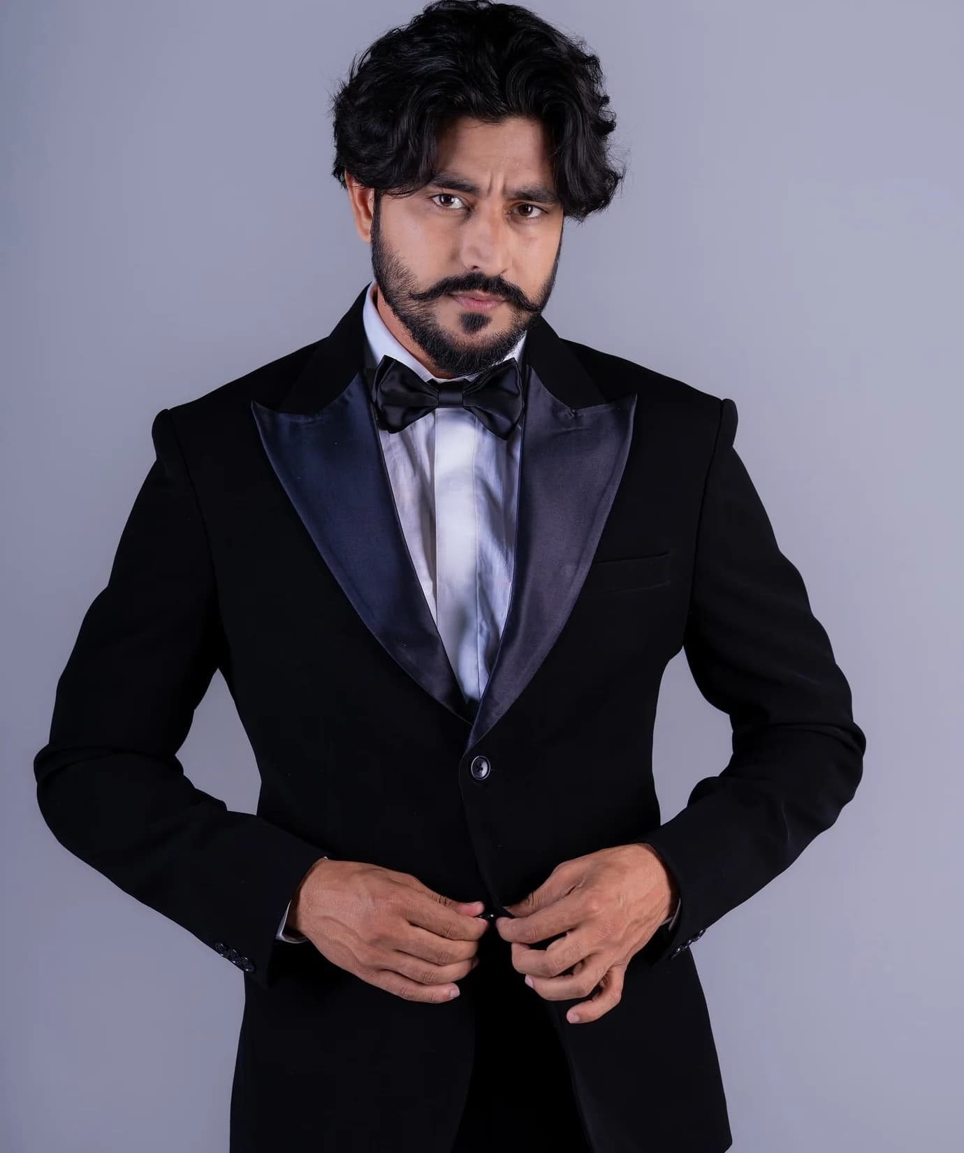 A midnight-lapel tuxedo